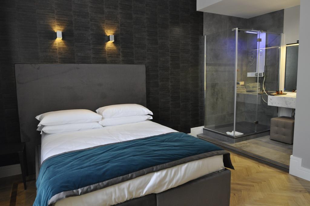 Place 24 Suites & Wellness Rome Kamer foto